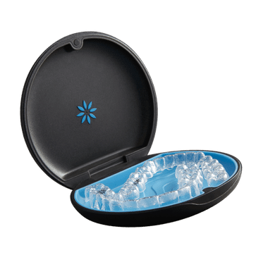 Black orthodontic retainer case with blue ice pack insert for temperature control storage.